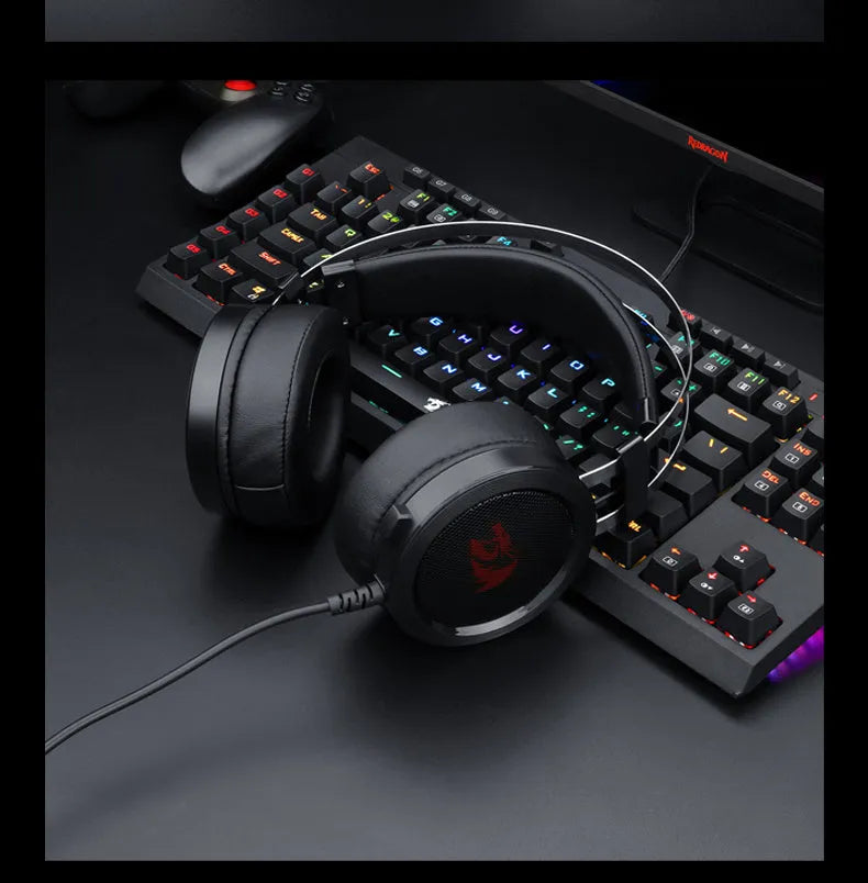 Black wired computer gaming headset showing the 3.5mm plug and long 2 metre cable.
