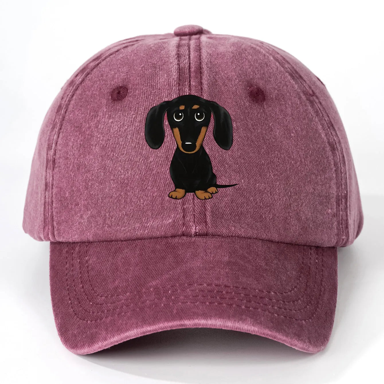 Retro washed cotton baseball cap with embroidered dachshund design on dome crown