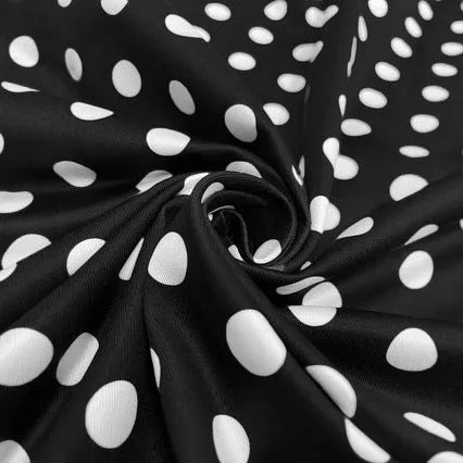 Women's multicolour polka dot dress with square collar, short sleeves, front zipper, and pleated A-line skirt.