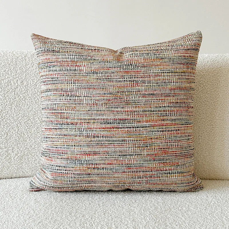 American-style jacquard paisley decorative pillow cover in amber tones on a sofa, showing square and rectangular size options.