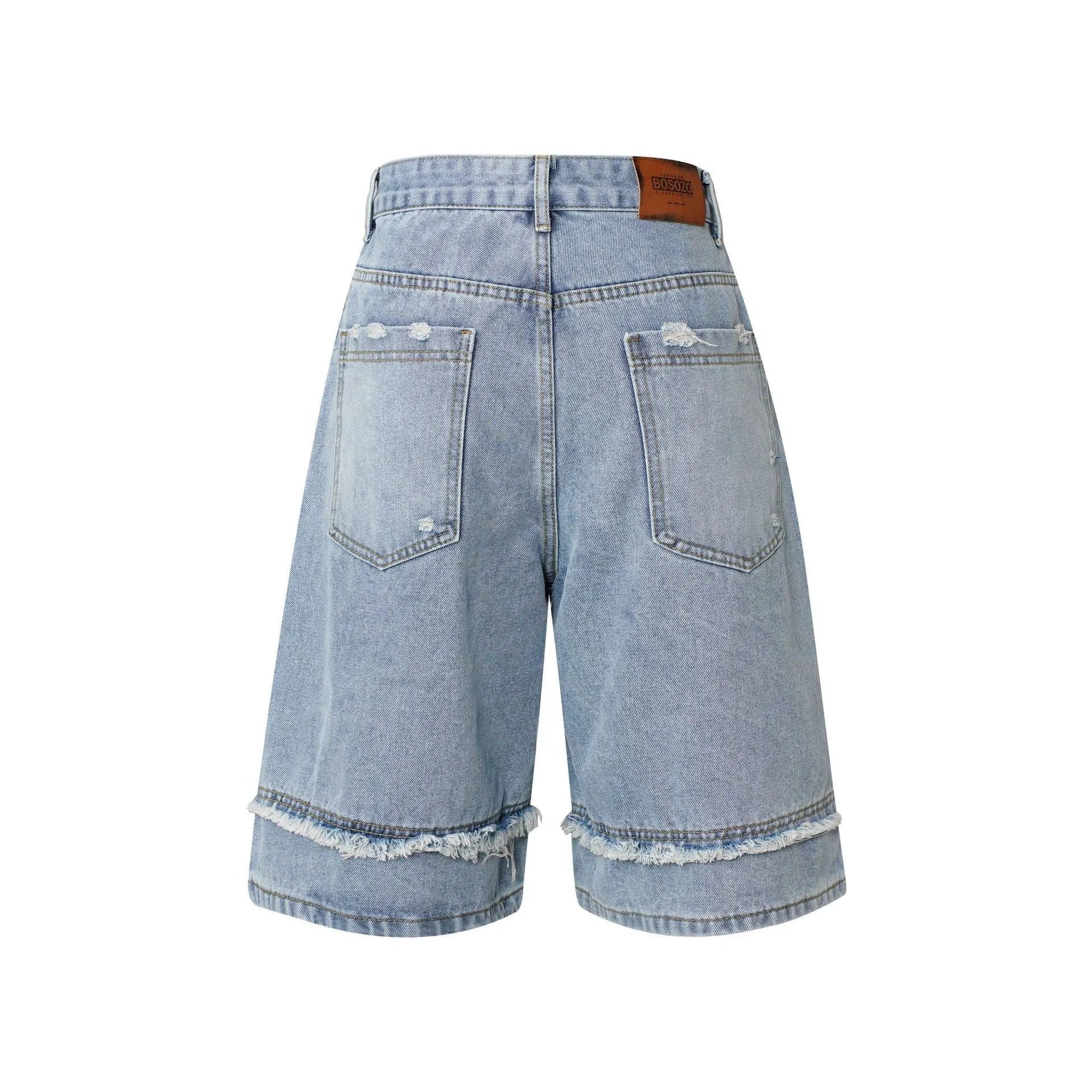 Distressed denim shorts with raw edge hem in straight cut hip hop style