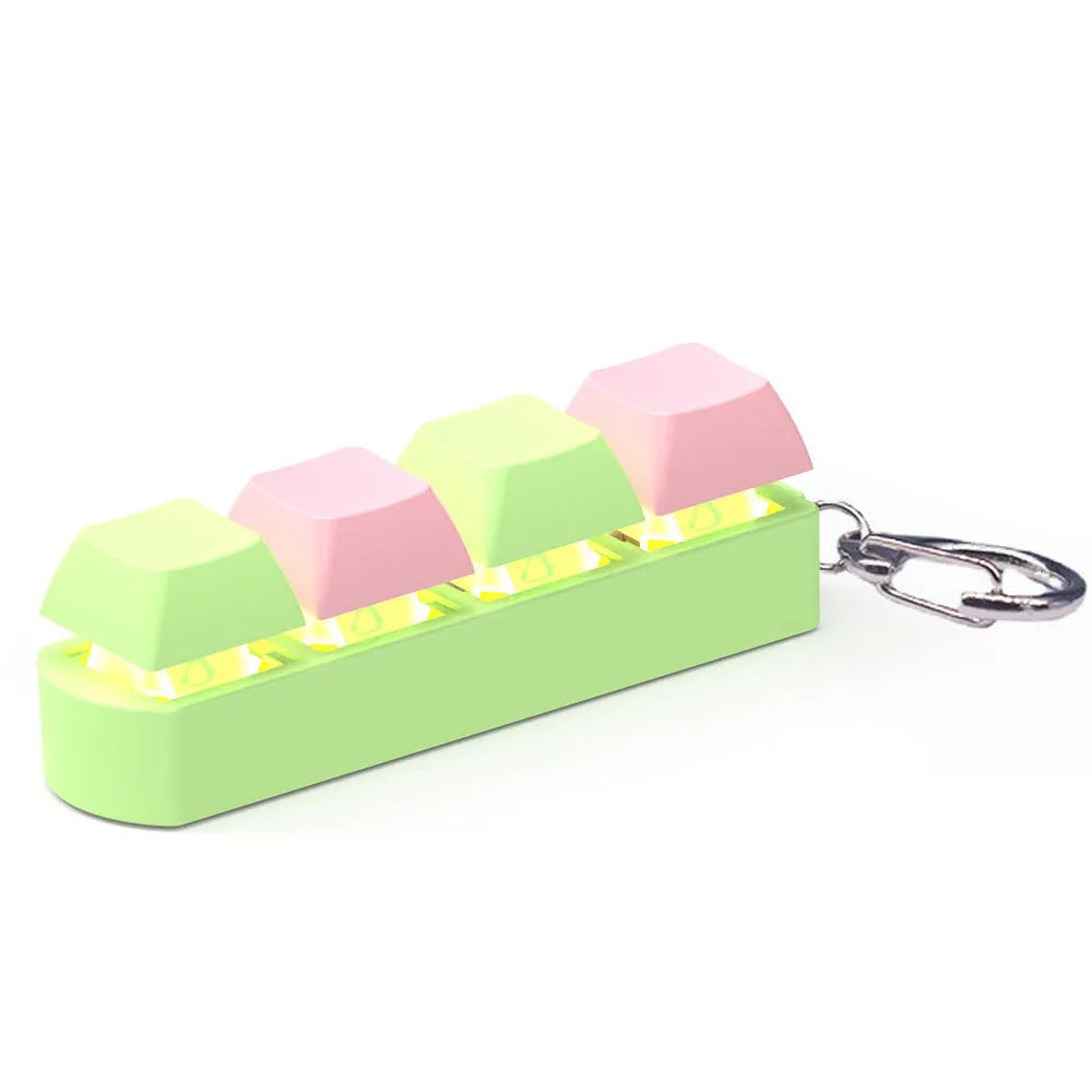 4-key keyboard switch shaft tester with transparent bottom shell showing switch sockets