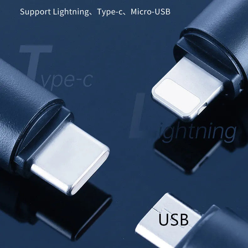 Black capsule infrared remote emitter with Lightning, USB-C, and micro-USB plug options on a white background.