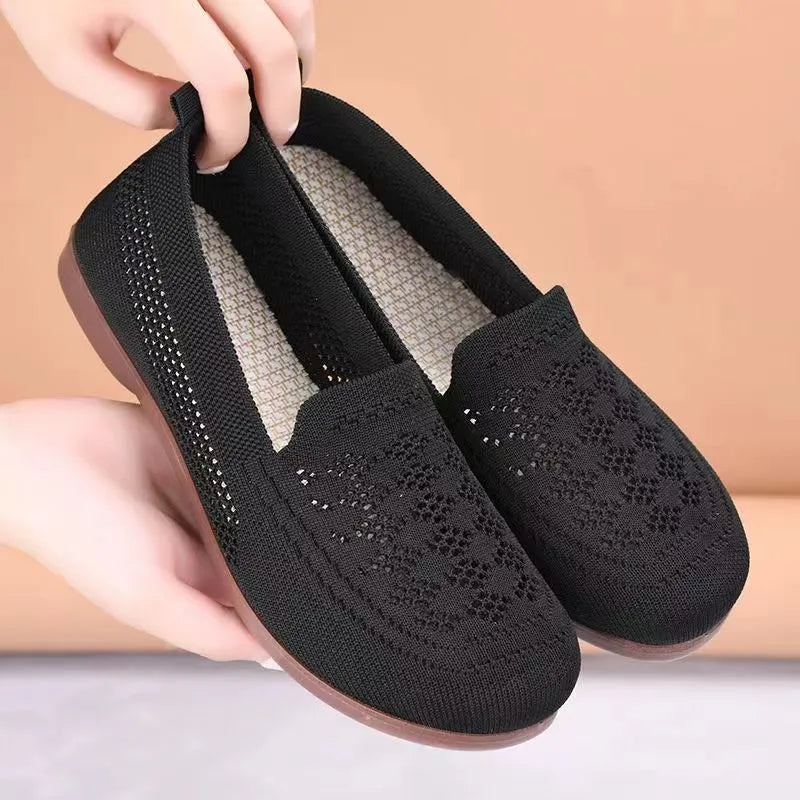 Women's beige low-top mesh tennis shoes with a round toe and anti-skid PVC sole, shown on a neutral background.