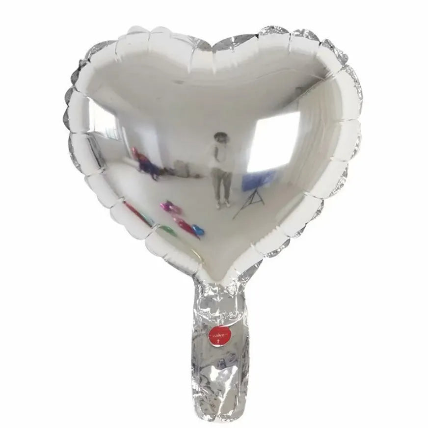 Five peach heart-shaped aluminium foil balloons in sparkling colours for party decoration