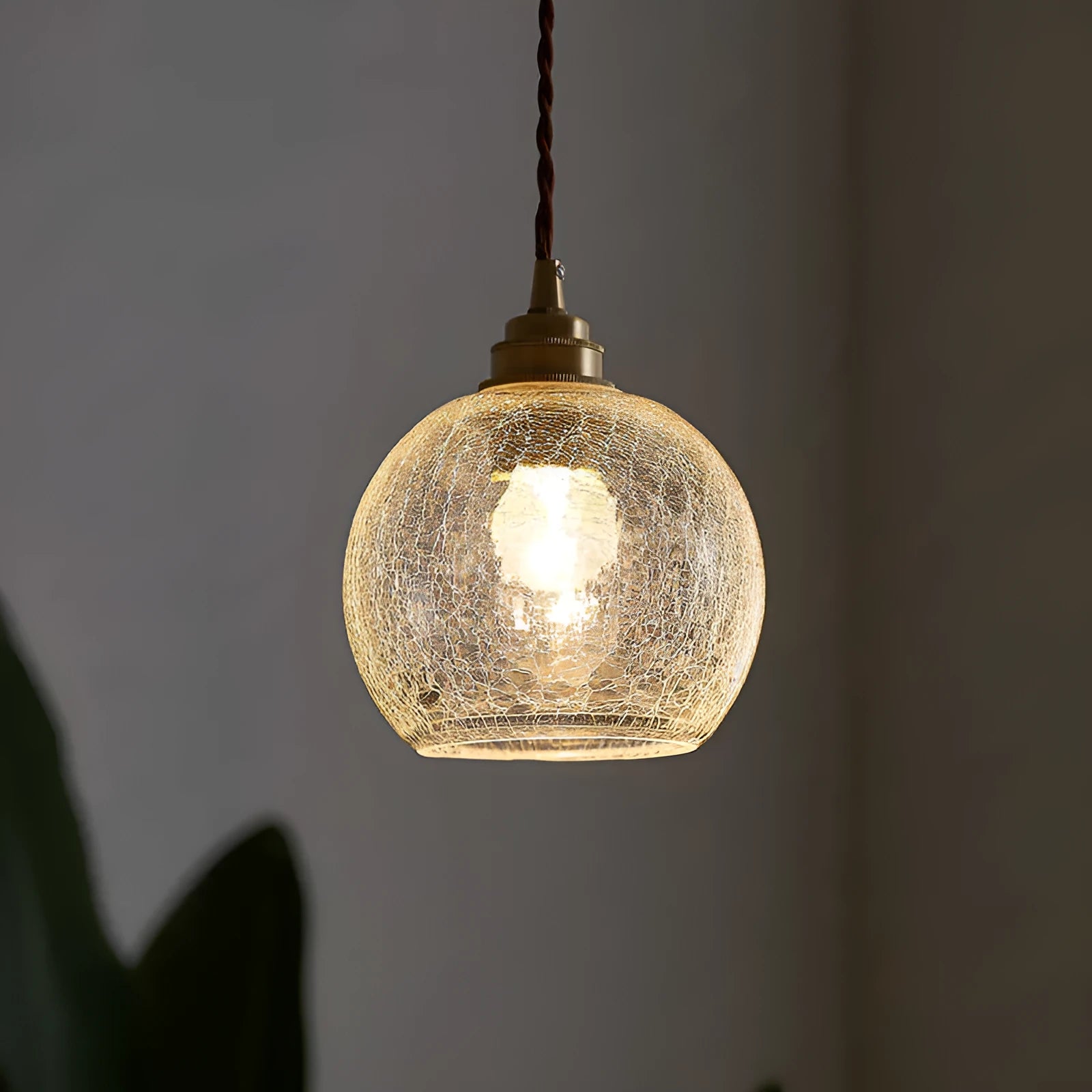 Brass electroplated copper chandelier with glass ball shade measuring 17.5cm diameter