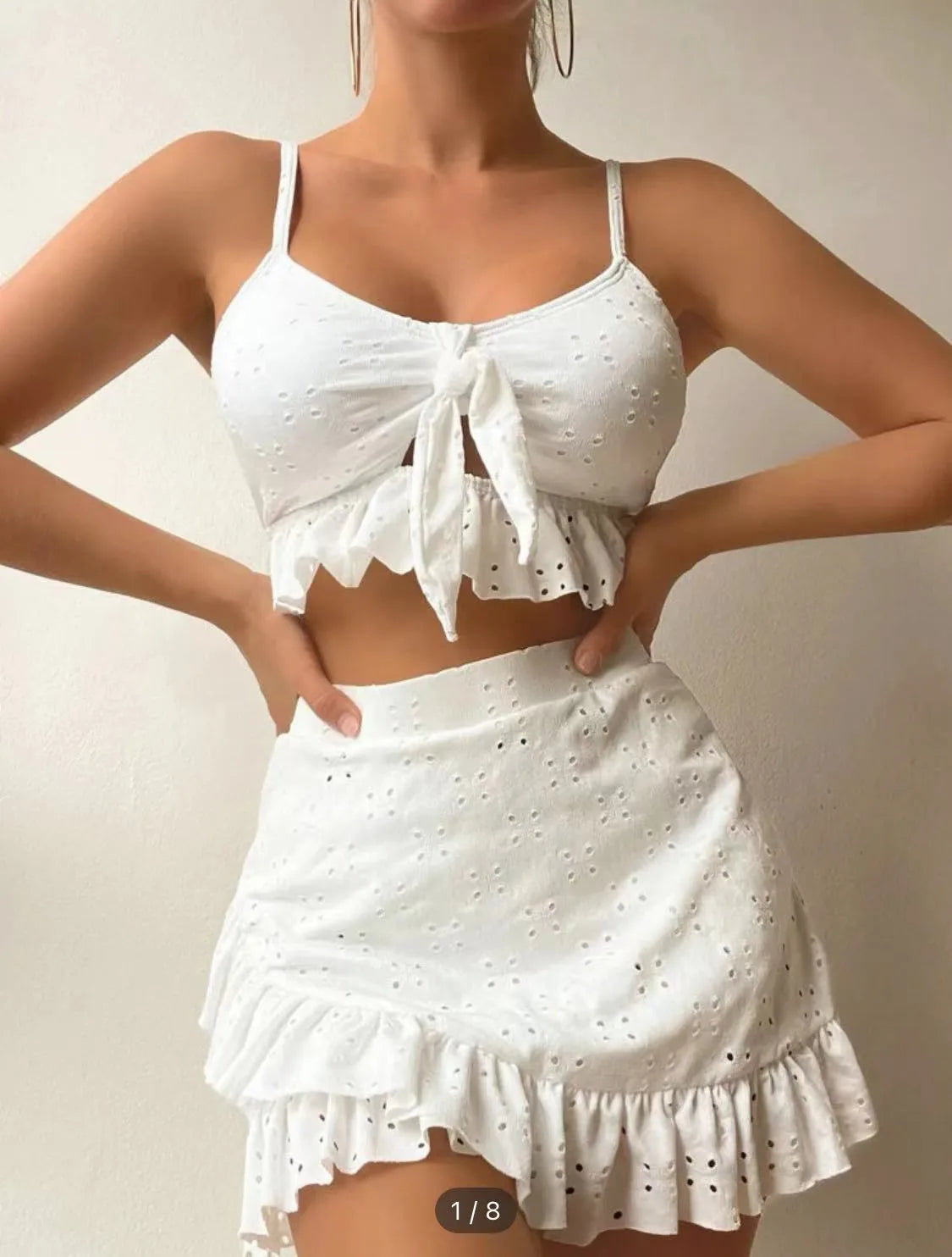 Women's solid colour three-piece bikini with split hip skirt in polyester fabric with lining