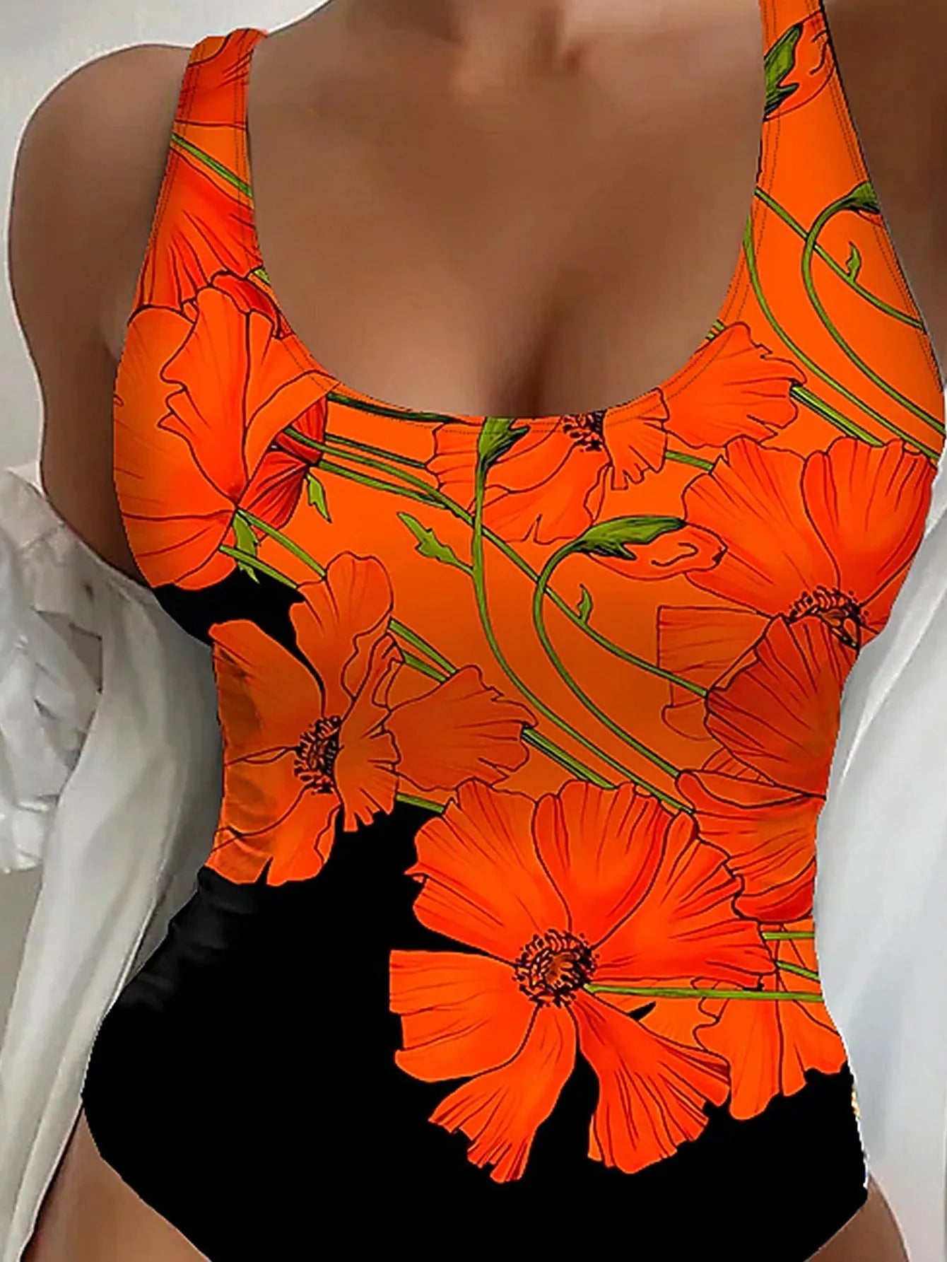 Orange floral printed one-piece swimsuit with backless design and slim fit style for women