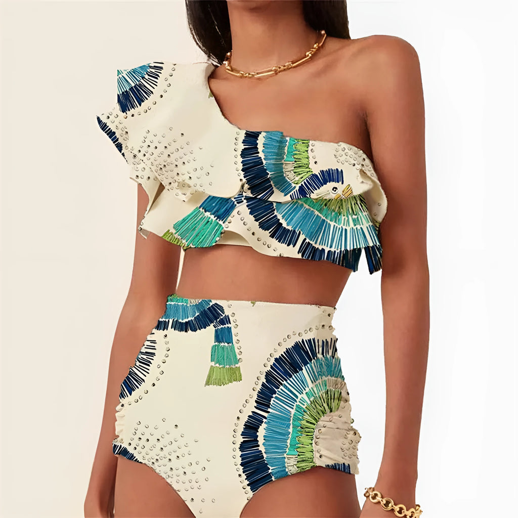 White women's one-shoulder swimsuit with large lotus leaf detail and split-leg design