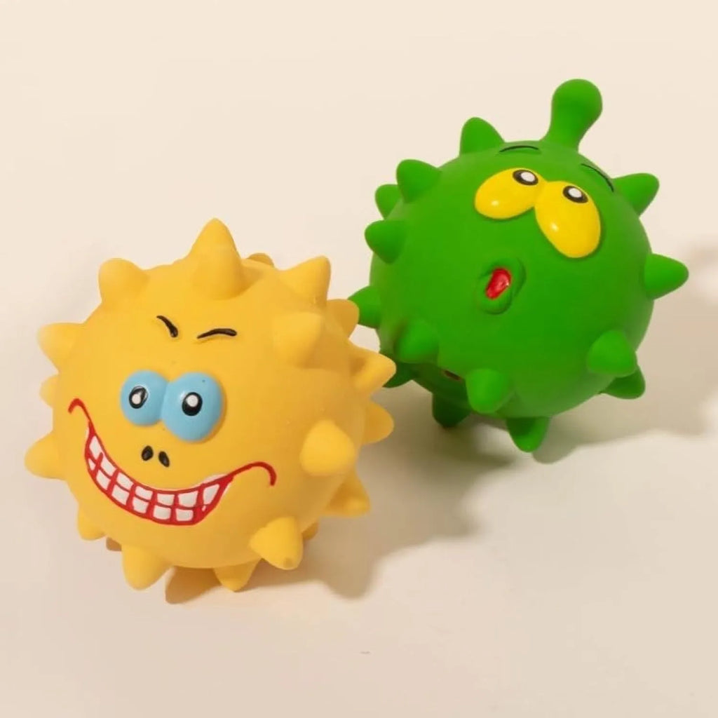 Set of colourful natural latex dog squeaky balls with bumpy surfaces and cute faces for teeth cleaning play