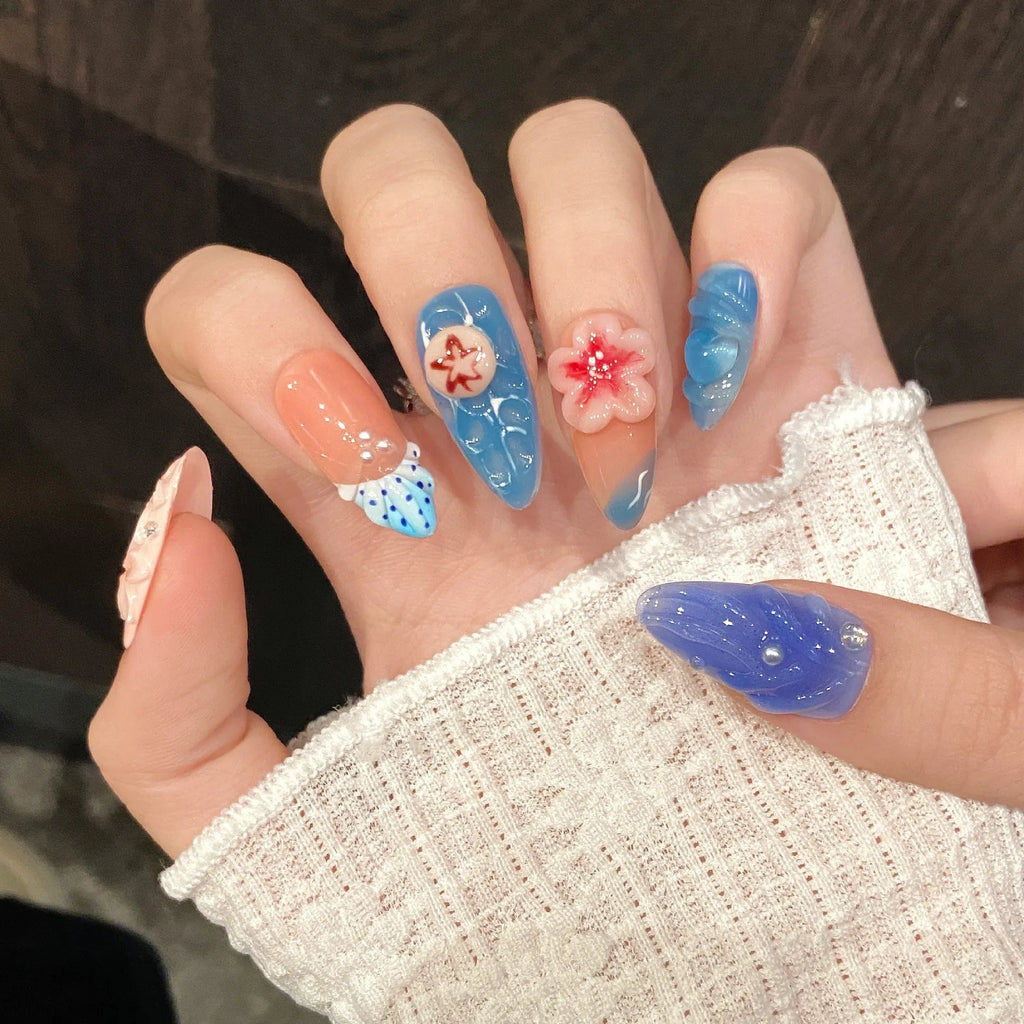 Three-dimensional carved jellyfish plastic wearable armour set in almond nail colour with marine patterns