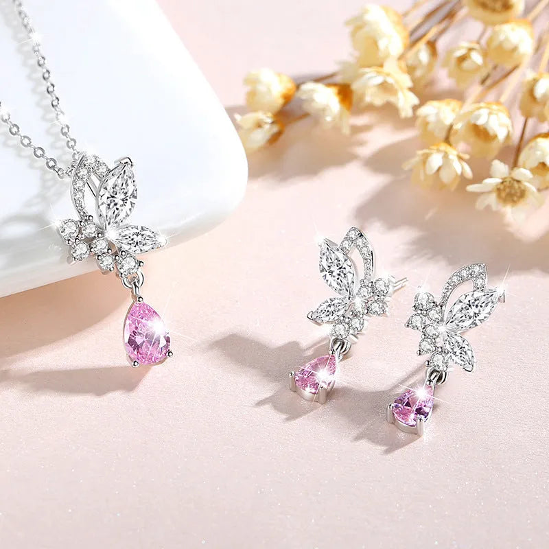 Butterfly crystal stud earrings in silver with decorative design