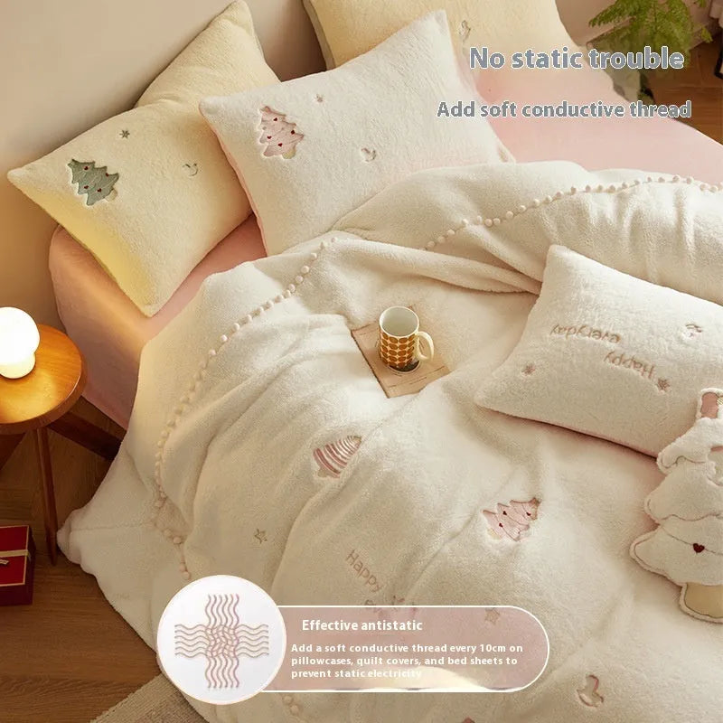 Winter milk fibre four-piece bedding set with green or pink Christmas tree pattern on a bed