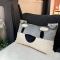Grey schnauzer design dog pillow cushion on a sofa, showing soft fabric and 50 cm width.