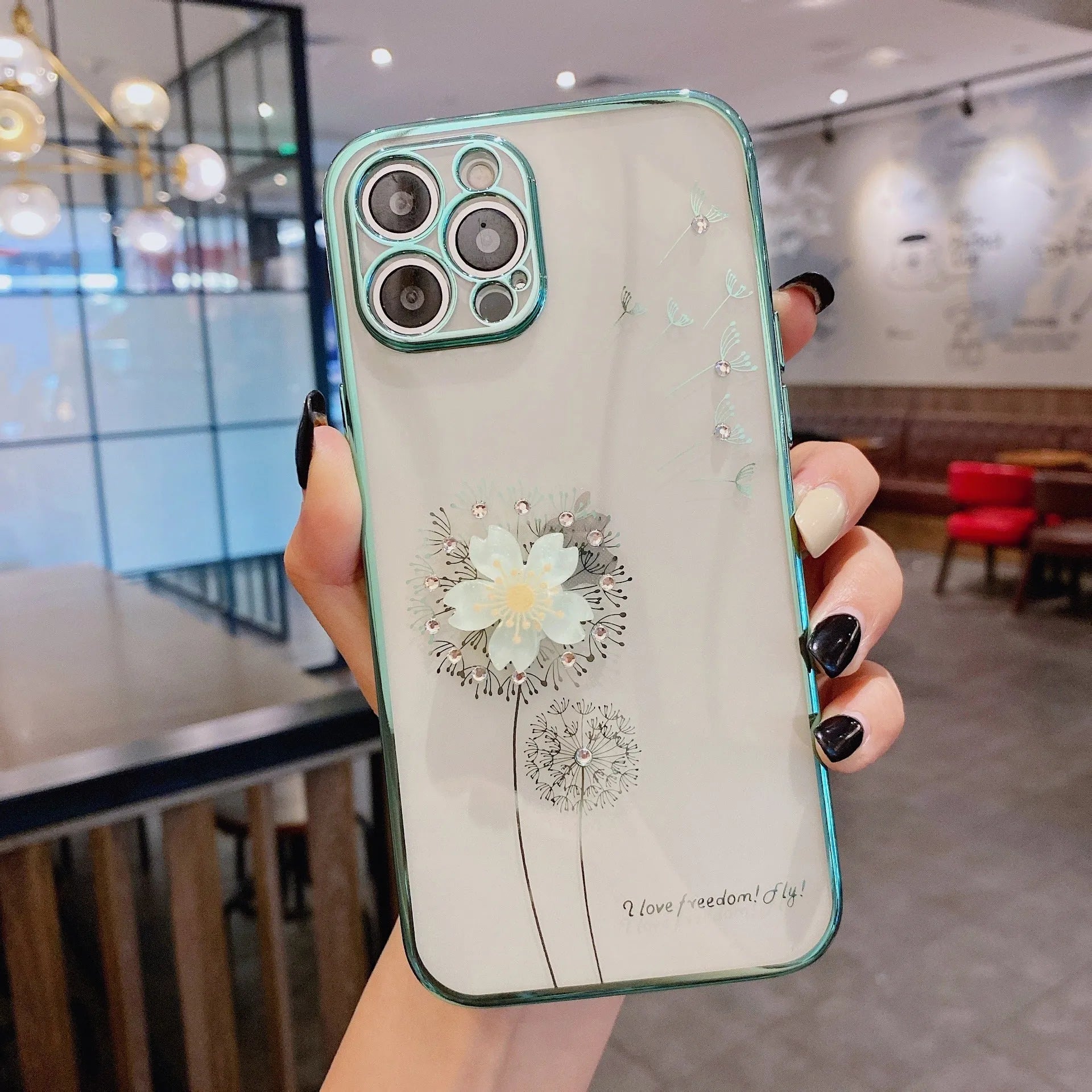 Green iPhone case with a 3D floral spin stand on the back and a built-in screen protector.