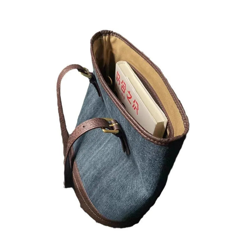 Denim patchwork handbag with one-shoulder bucket design showing dimensions