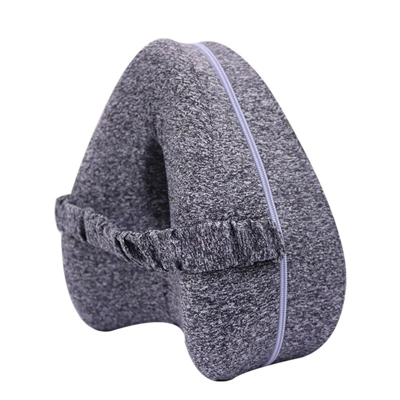 Love heart-shaped dark blue jacquard memory foam leg pillow for adult side sleepers.