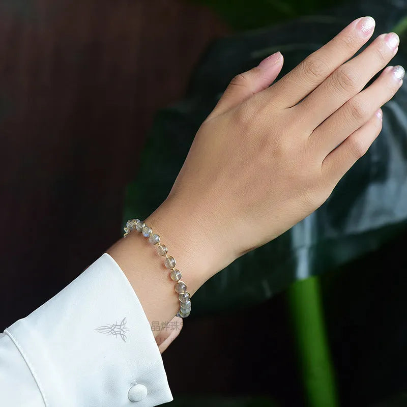 Women's moonstone crystal bracelet with 14K gold gilded metal and starry sky colour design