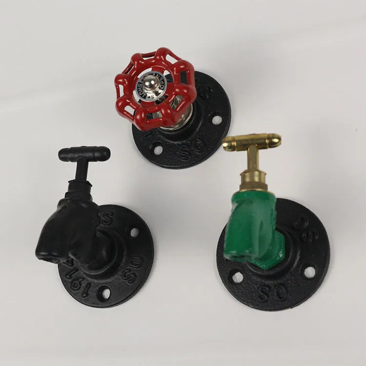 Metal wall hanging hook with water pipe design in choice of black, green, or red finish.