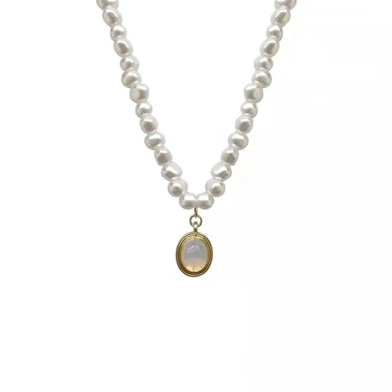 French Court vintage necklace with geometric alloy pendant and pearls on an adjustable 21-50cm chain.