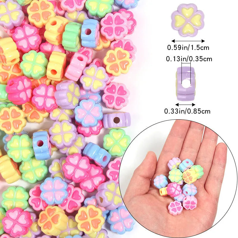Acrylic clover craft beads with frosted finish in mixed colours including pink, blue and green