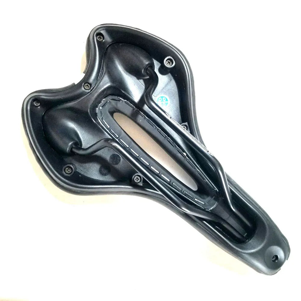 Bicycle saddle with black PU leather, showing spring suspension underside and included wrench and tyre patch.