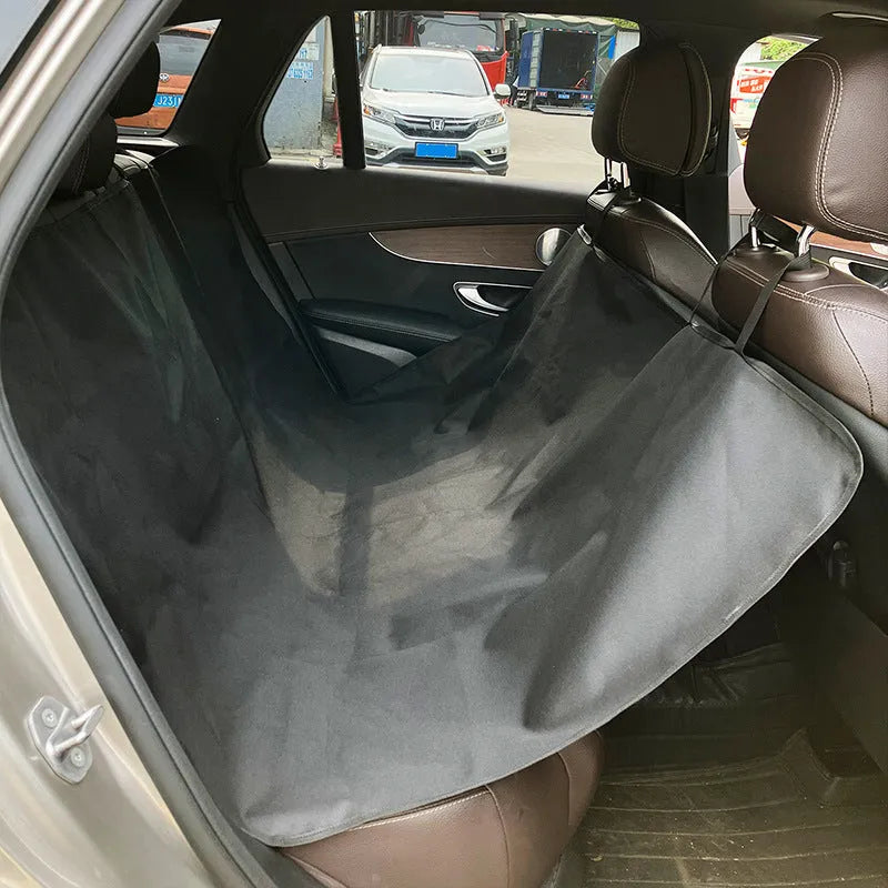 Dog car seat protection mat covering rear vehicle seat with water and dirt resistant cloth material