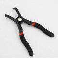 Red interior round nail removal pliers with PVC handles, showing jaw opening for fastener extraction.