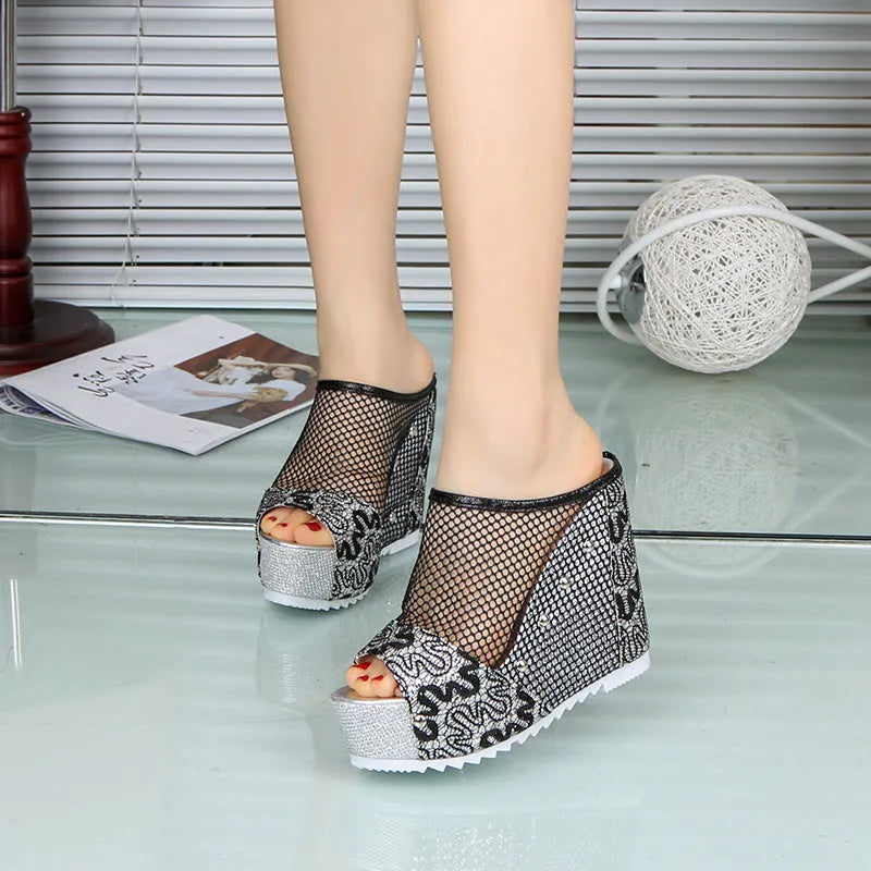 Korean style women's chunky heel platform flip-flops with hollowed-out heel and mesh upper in black.