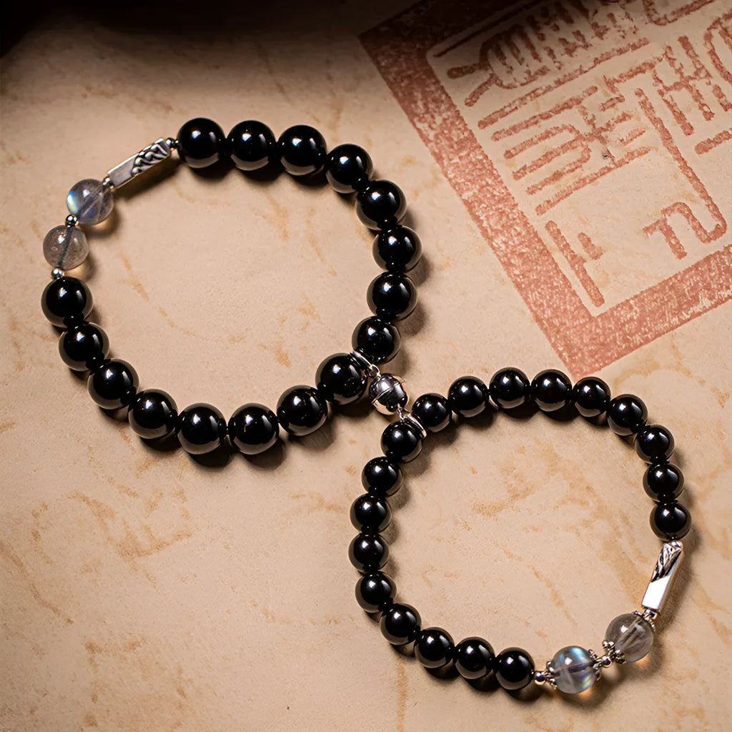 Obsidian Buddha beads couple bracelet DIY set showing 10mm men's and 8mm women's sizes in national style