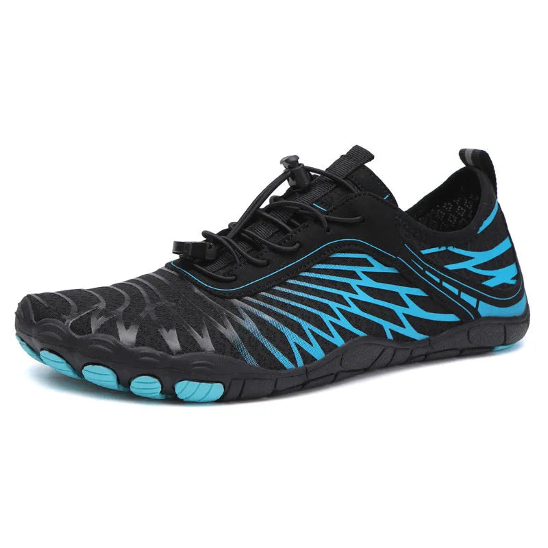 White and pink lace-up sports shoes with rubber sole on a plain background