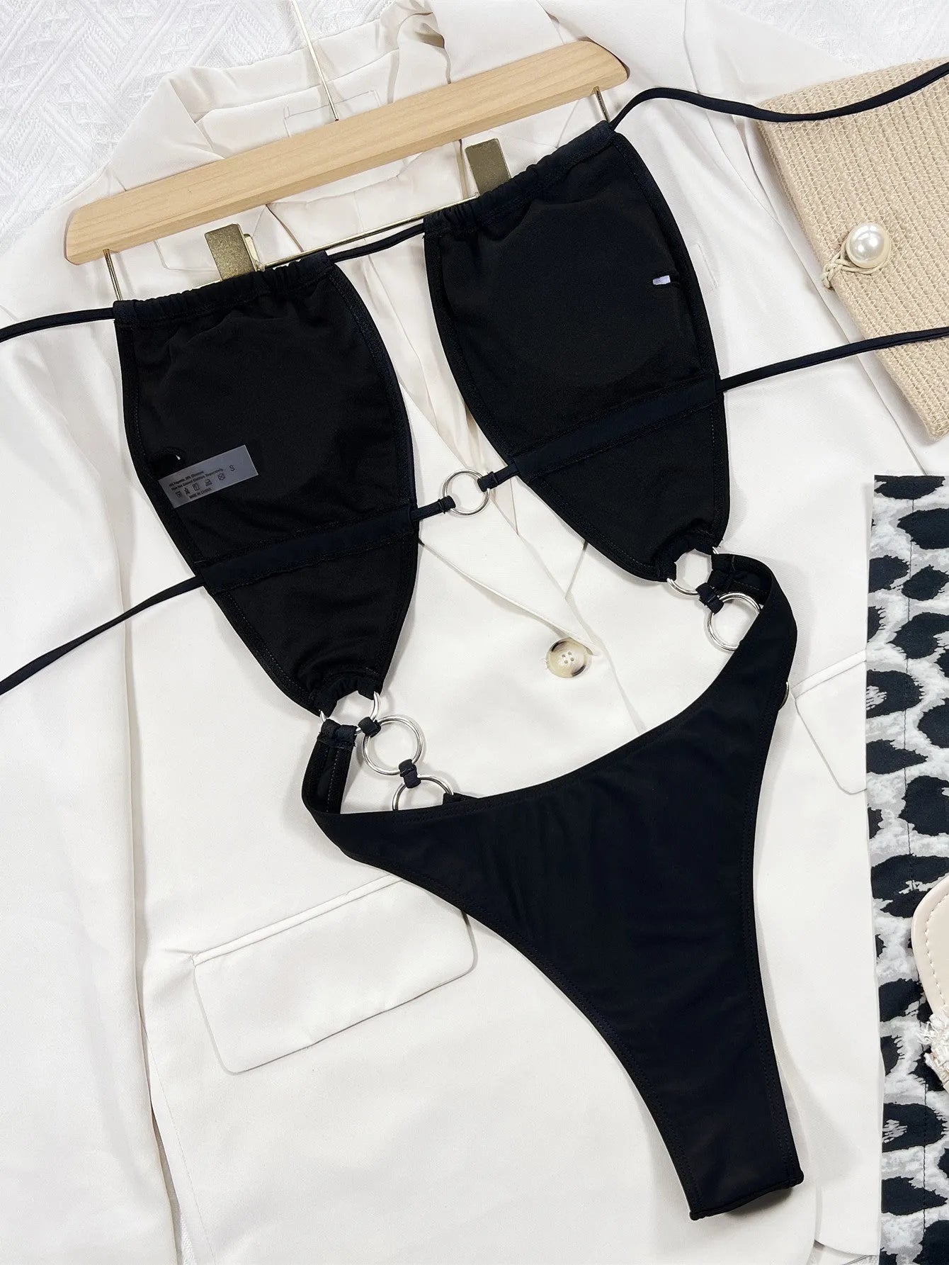 Black sleeveless one-piece swimsuit for women in solid colour design