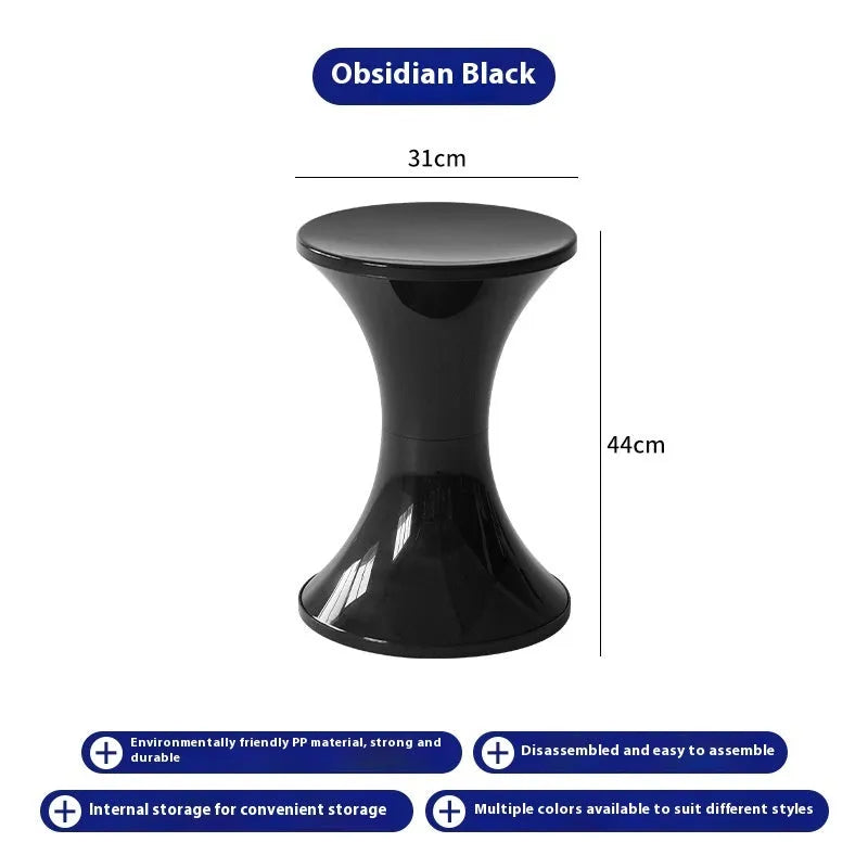 A plastic hourglass-style shoe changing stool in one of five available colours: black, green, red, white, or brown.