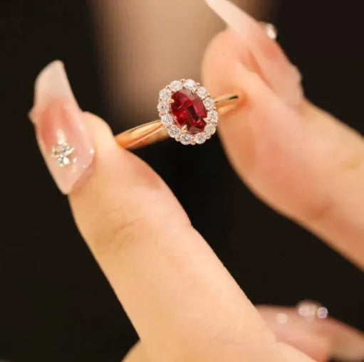 Women's silver ring with blood ruby artificial gemstone and gold pigeon floral design