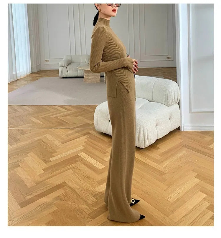 Women's knitted three-piece set showing top, wide-leg trousers, and cardigan in solid colour with leather stitching details