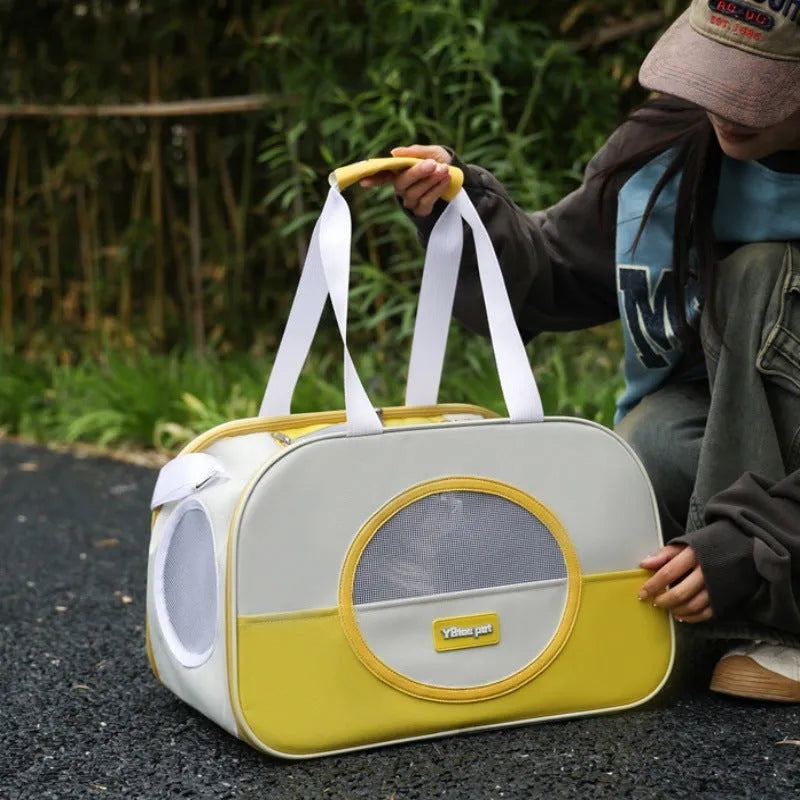 Blue foldable oxford cloth cat carrier backpack shown in outdoor setting