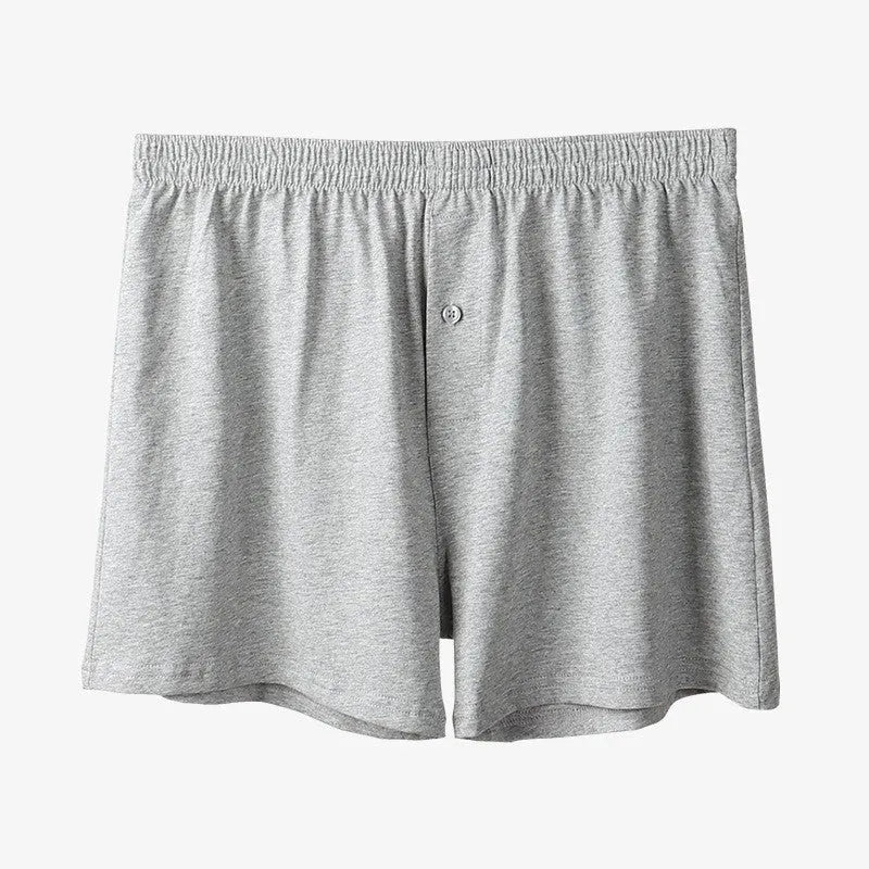 Men's cotton boxer shorts in light grey, dark blue and black colours showing high waist loose fit design