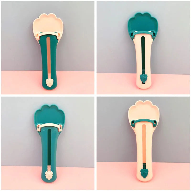 Green and pink pet feed spoon with integrated treat extrusion tool and liquid food squeezer feeder