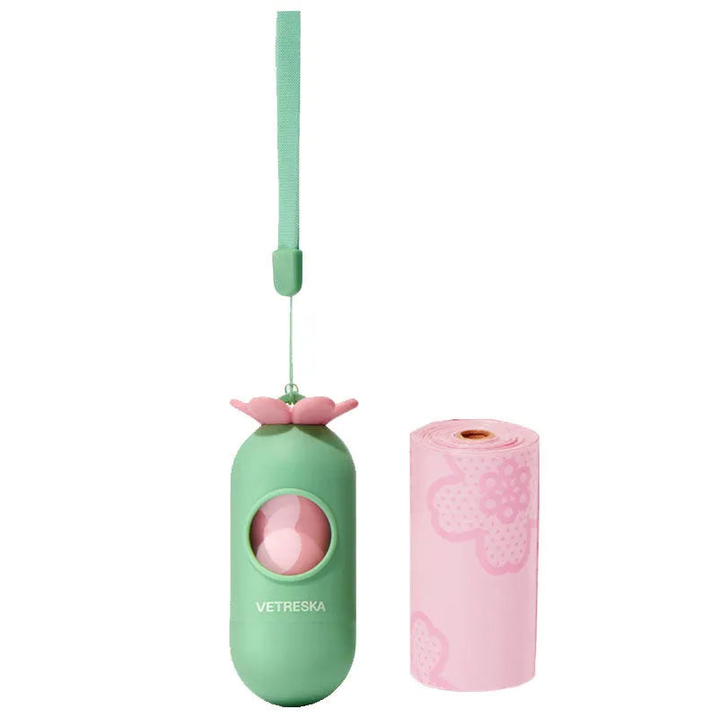 Portable dog poop bag dispenser capsule with scented inner bags in strawberry, orange and cherry blossom options