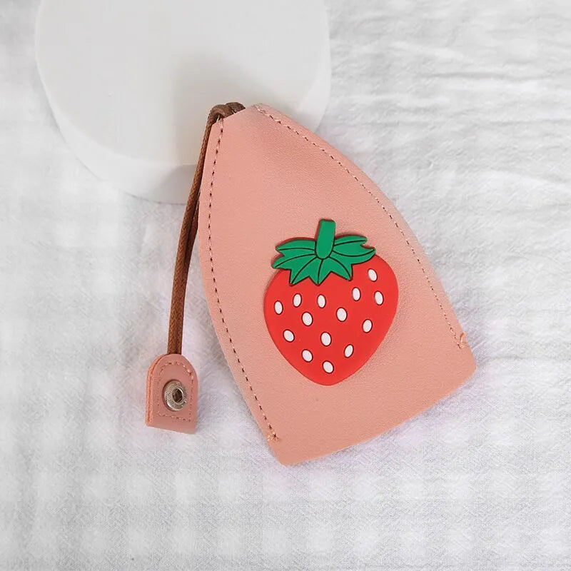 Colourful cartoon pull-out key case made from PU leather, showing the key extended from its protective sleeve.