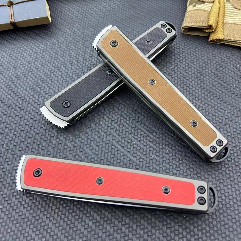 CRKT 7190 folding fruit knife showing blade and handle with colour options of black, brown, and red