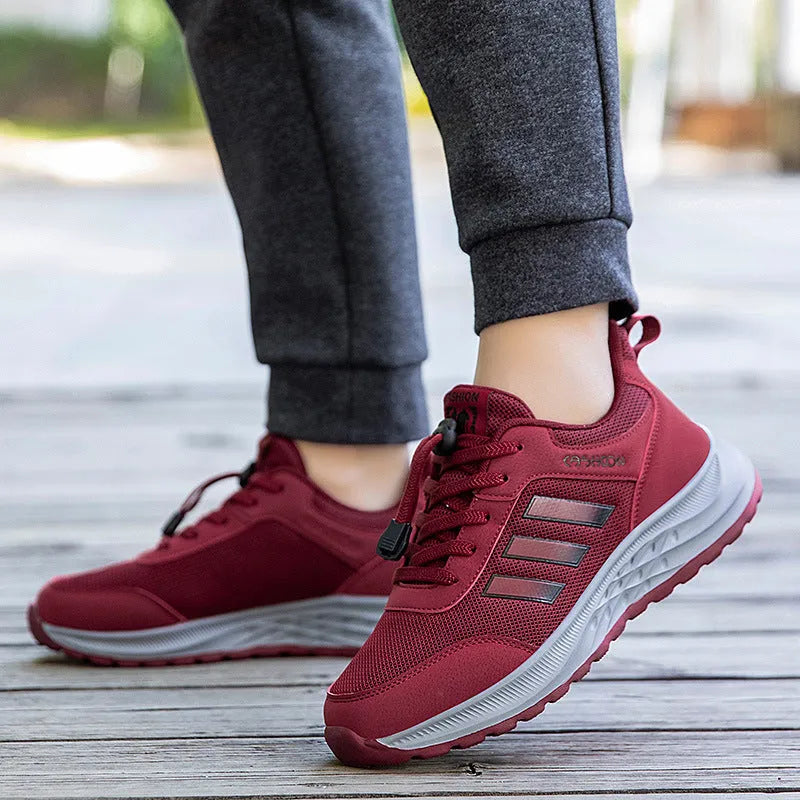Breathable mesh slip-on casual shoes for men and women with elastic band.