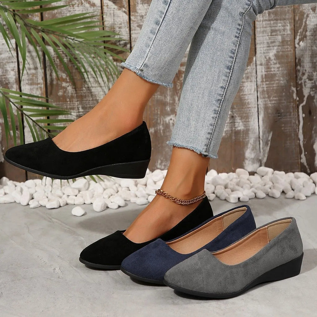 Women's suede wedge pumps with pointed toe and low rubber heel in five colour options