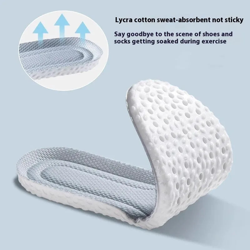 A pair of breathable, soft grey PU sports shoe insoles on a white background, showing their textured surface.