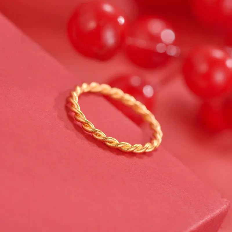 Women's brass gold plated ring showing twist, matte, and glossy simple bracelet styles