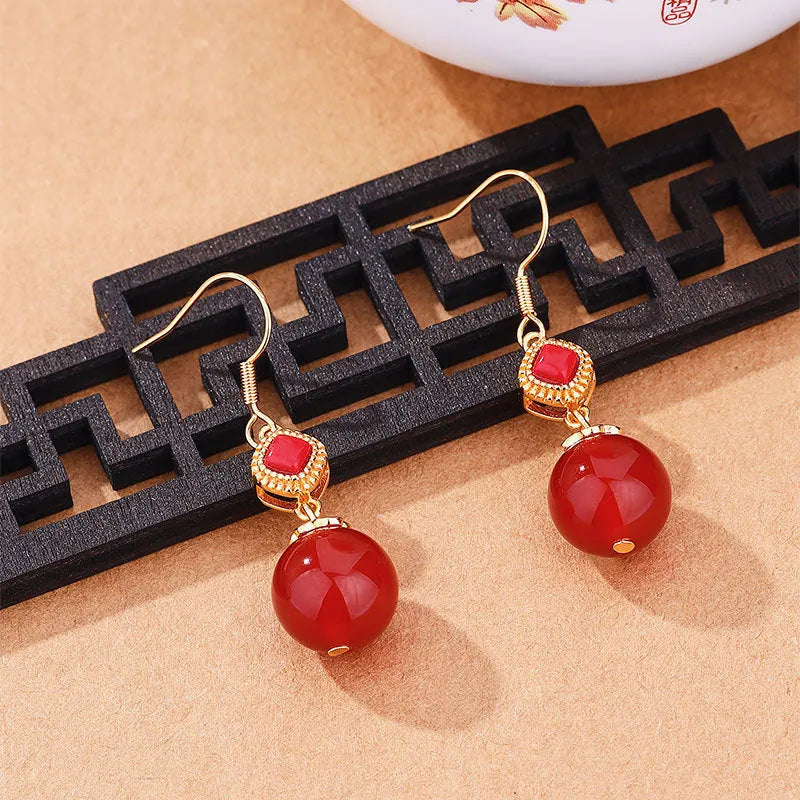 Southern Red Agate round bead earrings with S925 silver inlay and jasper accents