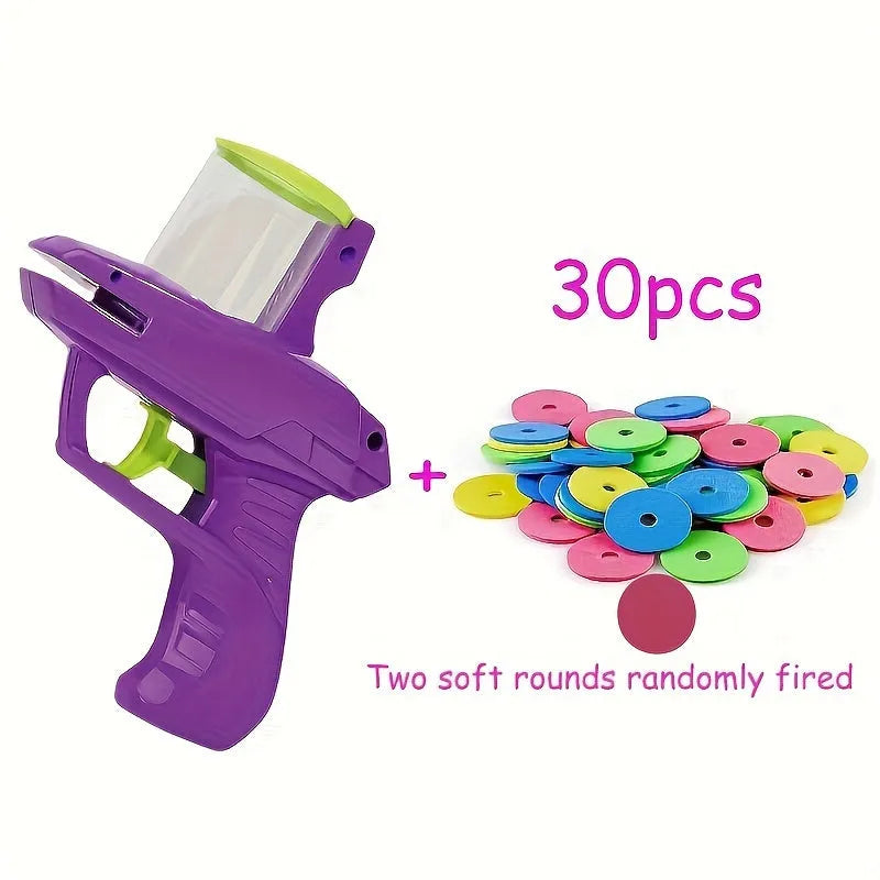 Interactive cat toy launcher with foam discs in green or purple colours