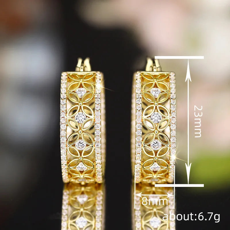 Copper ear clips with horse eye, flower and butterfly design on geometric shapes in yellow gold finish