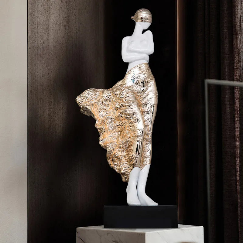 48cm tall sculptured character ornament in metallic rose gold finish with modern minimalist design