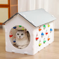 Plastic cat scratch board with integrated nest and bell ball tunnel for house cats